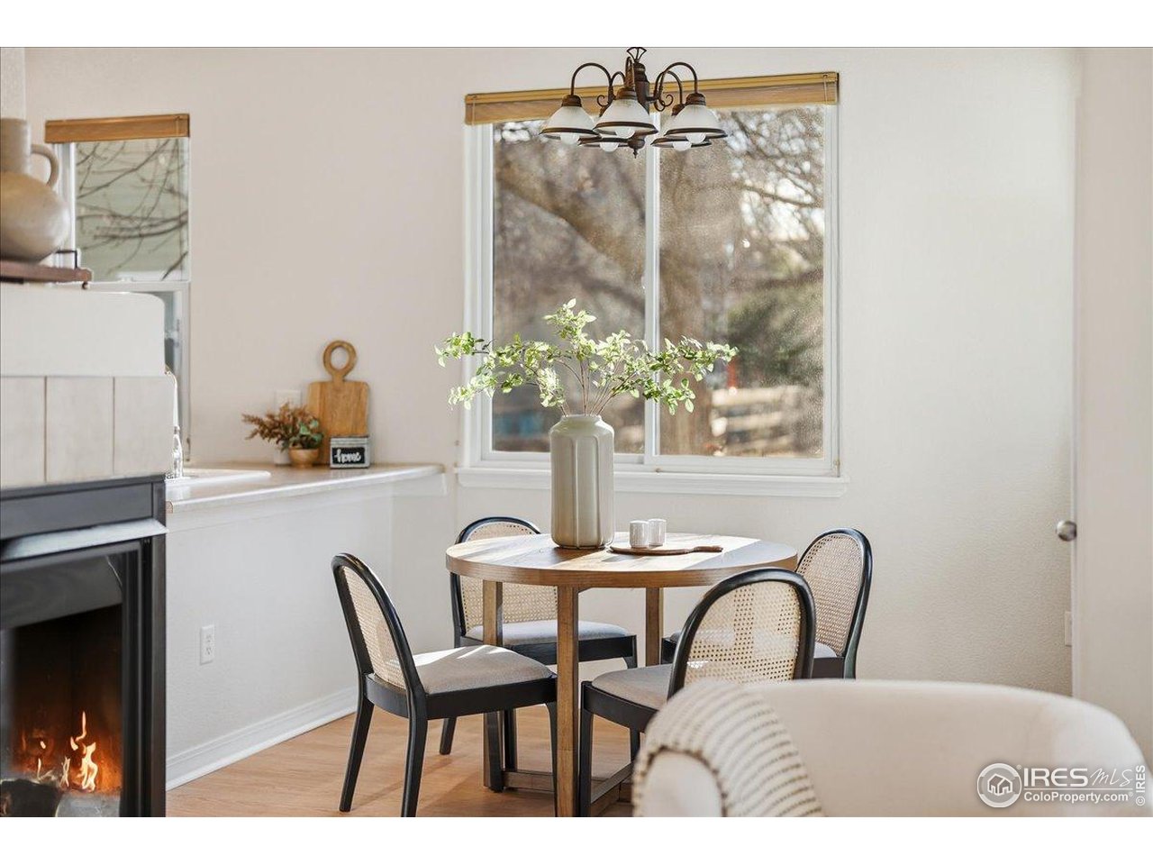 2287 Trestle Road Fort Collins, CO 80525 - Photo 13 of 40 a view of a dining room with furniture window and outside view