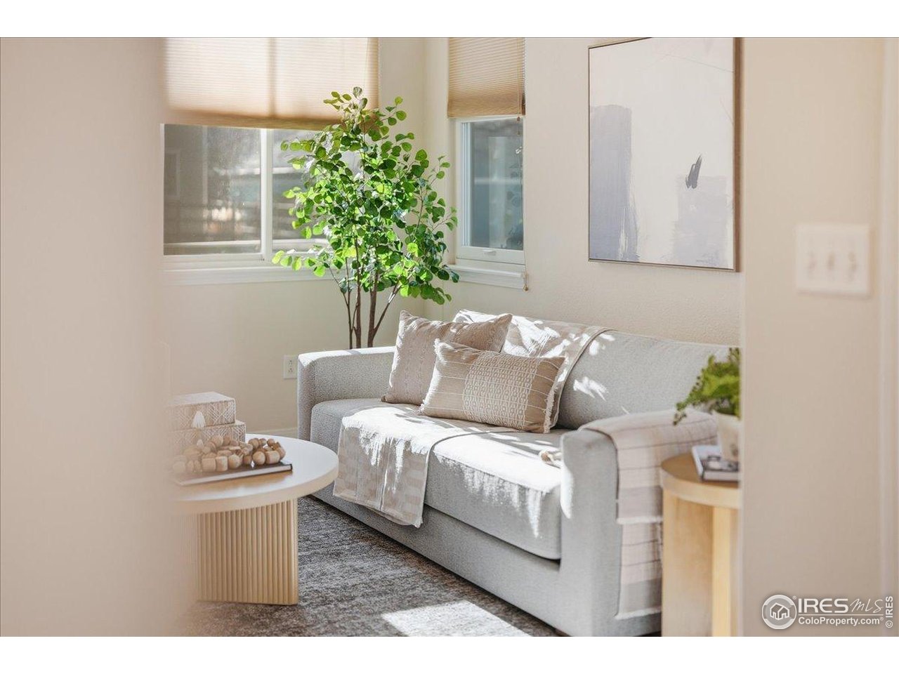 2287 Trestle Road Fort Collins, CO 80525 - Photo 14 of 40 a bedroom with bed and a potted plant