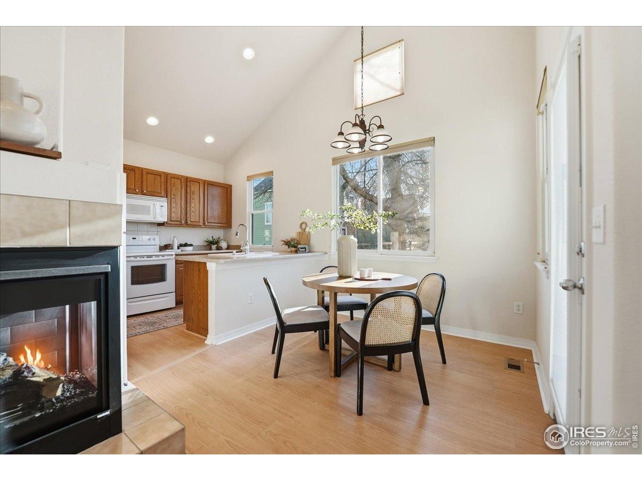 2287 Trestle Road Fort Collins, CO 80525 - Photo 2 of 40 a dining room with furniture and window