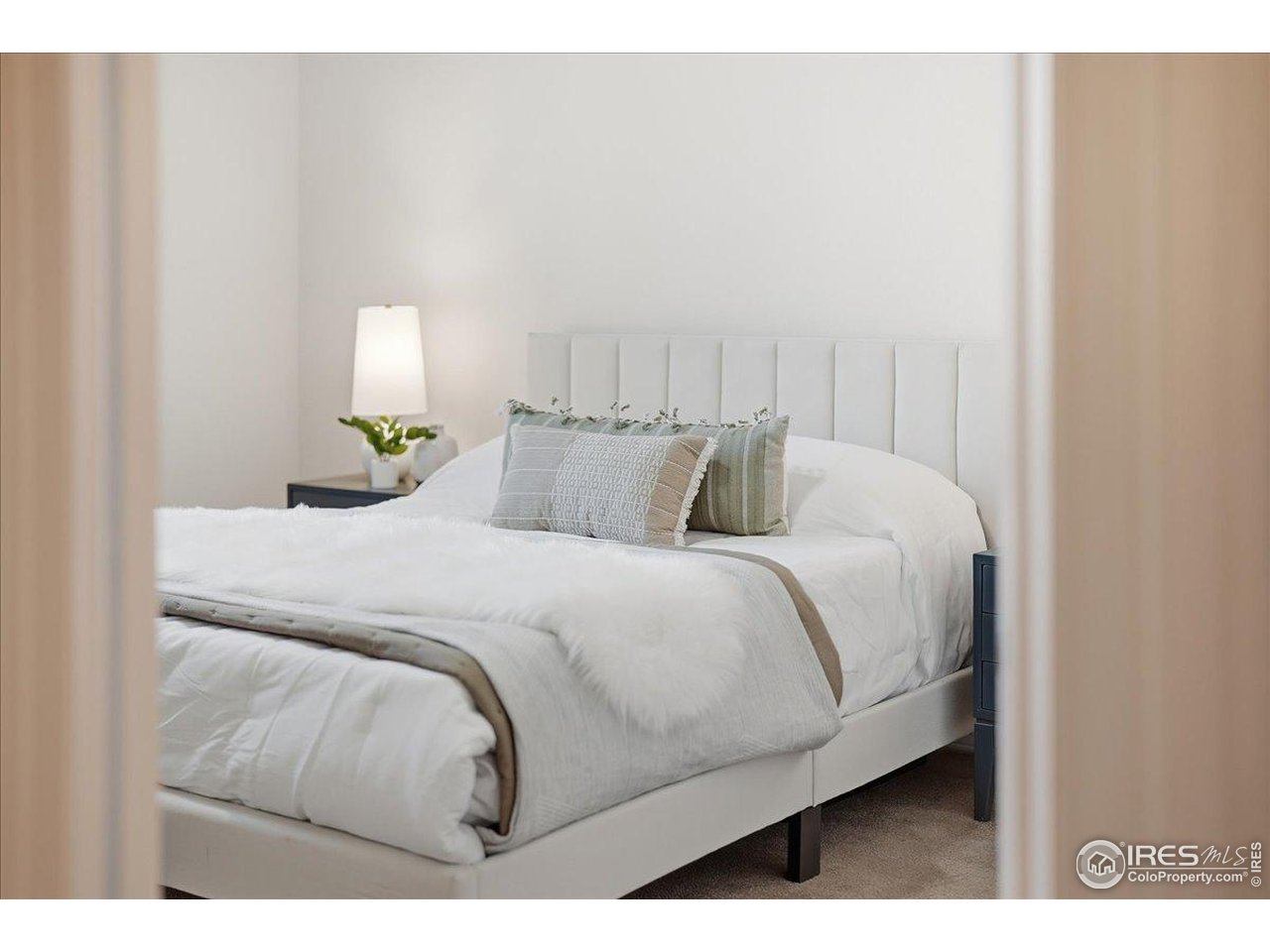 2287 Trestle Road Fort Collins, CO 80525 - Photo 21 of 40 a bedroom with a bed and window