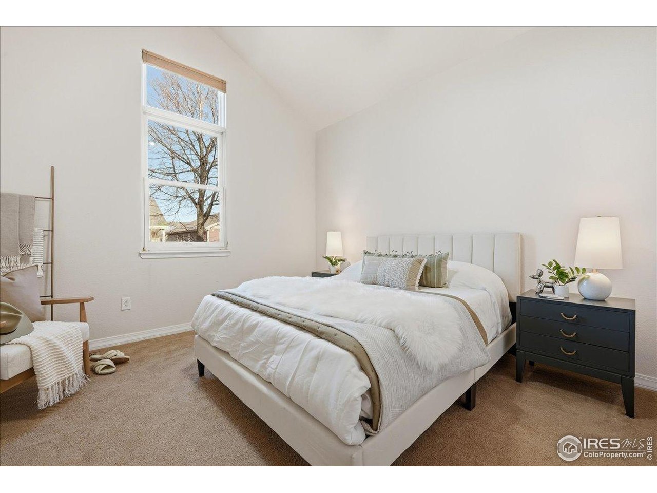 2287 Trestle Road Fort Collins, CO 80525 - Photo 23 of 40 a bedroom with a bed and window