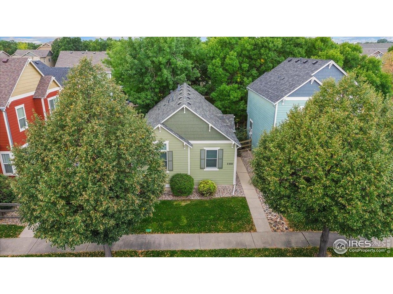 2287 Trestle Road Fort Collins, CO 80525 - Photo 31 of 40 a view of house with a yard