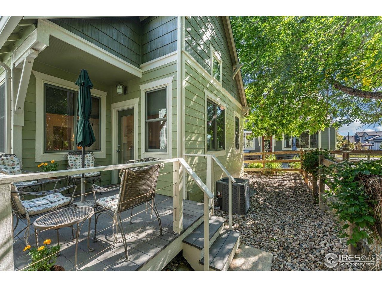 2287 Trestle Road Fort Collins, CO 80525 - Photo 32 of 40 a view of a house with backyard porch and sitting area