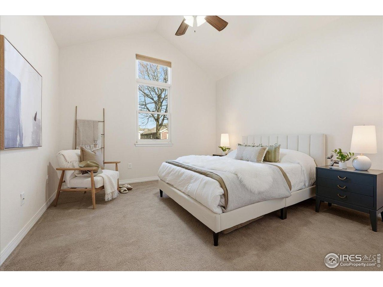 2287 Trestle Road Fort Collins, CO 80525 - Photo 4 of 40 a bedroom with a bed and window