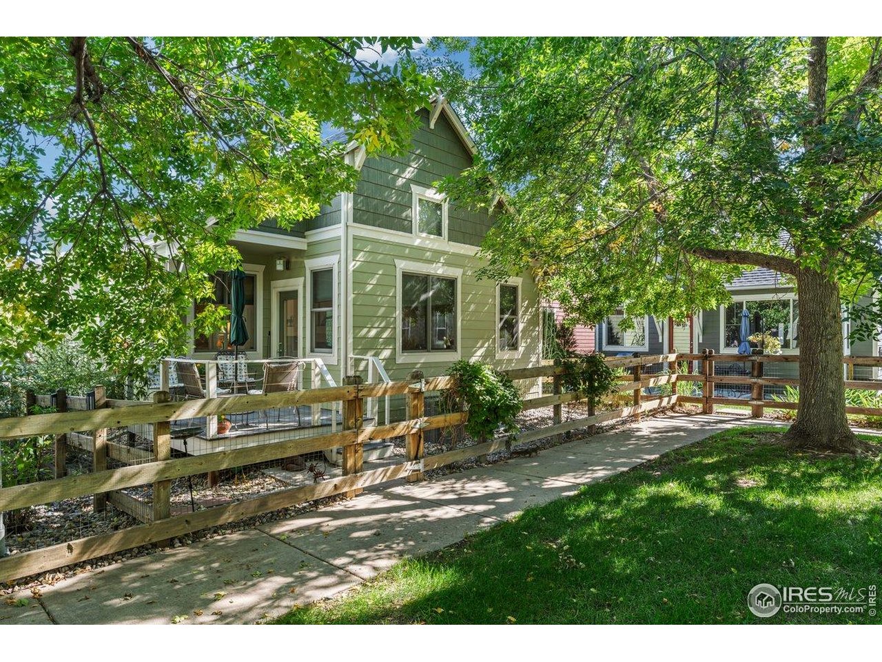2287 Trestle Road Fort Collins, CO 80525 - Photo 6 of 40 a view of a house with backyard porch and sitting area