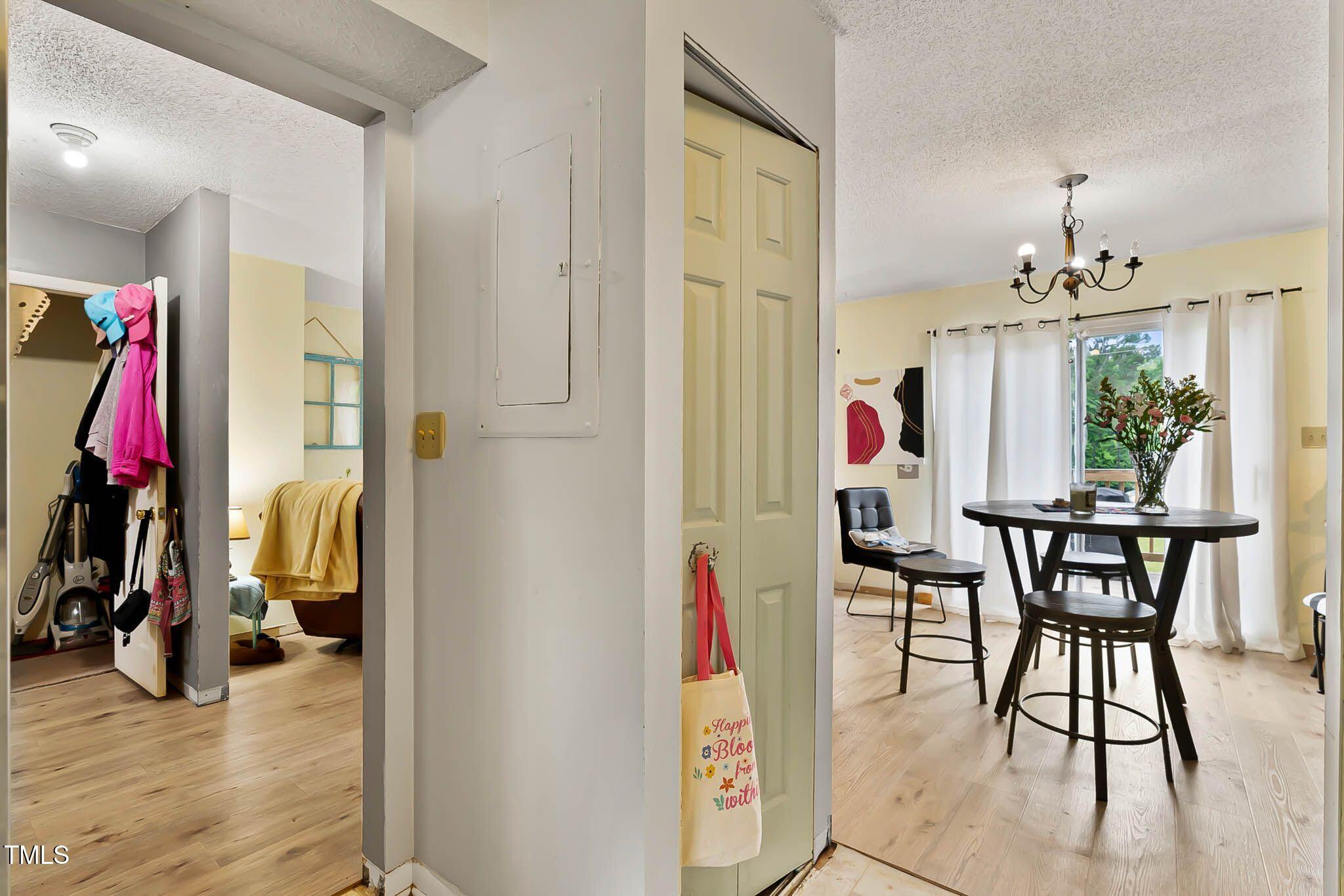 5931 Farm Gate Road Raleigh, NC 27606 - Photo 9 of 37 a view of a room with furniture and wooden floor