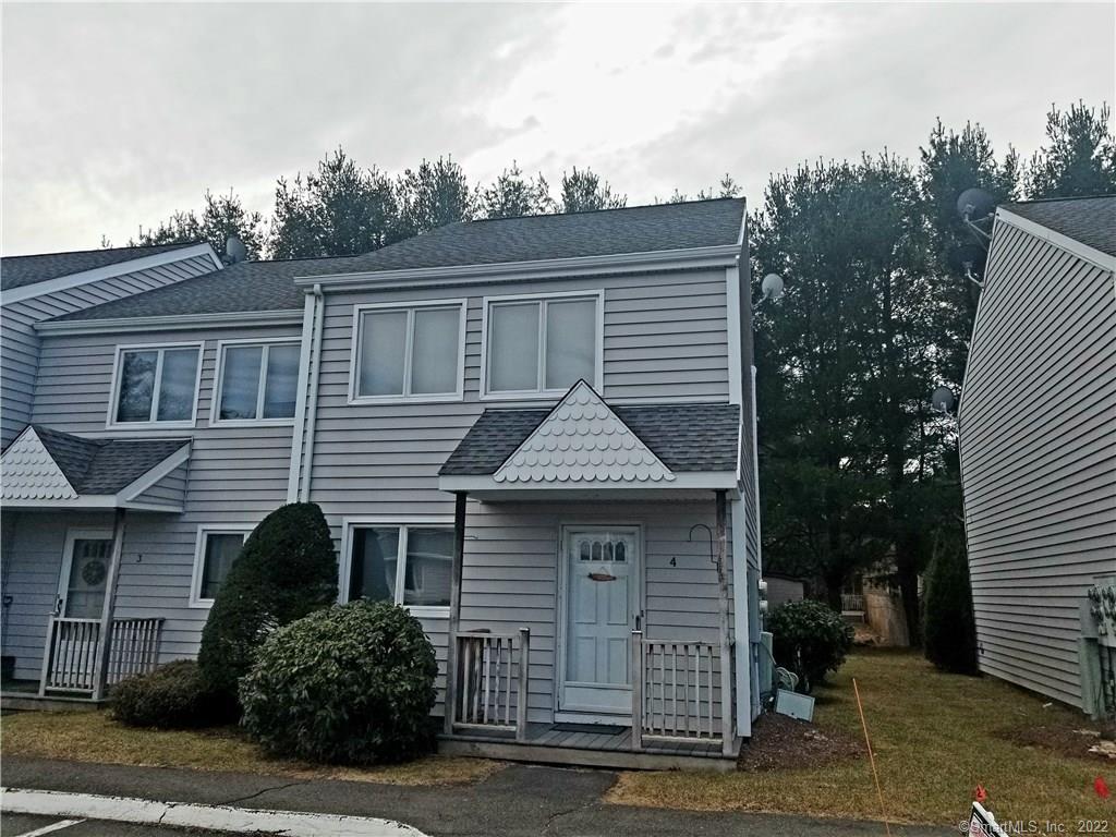 482 Lake Avenue, Unit 4 Bristol, CT 06010 - Photo 1 of 1 a front view of a house with garden