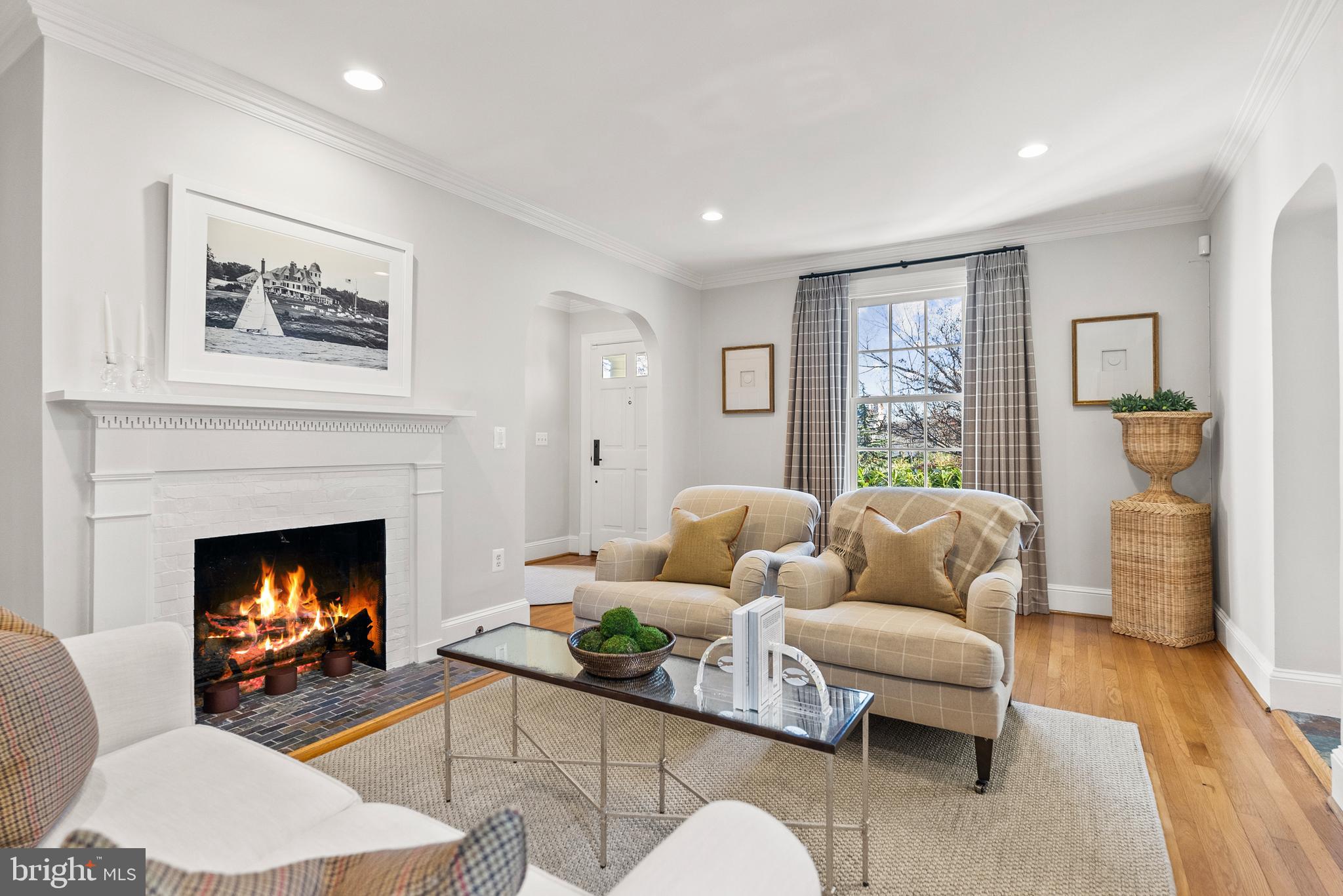 6032 Fort Hunt Road Alexandria, VA 22307 - Photo 11 of 49 a living room with furniture and a fireplace