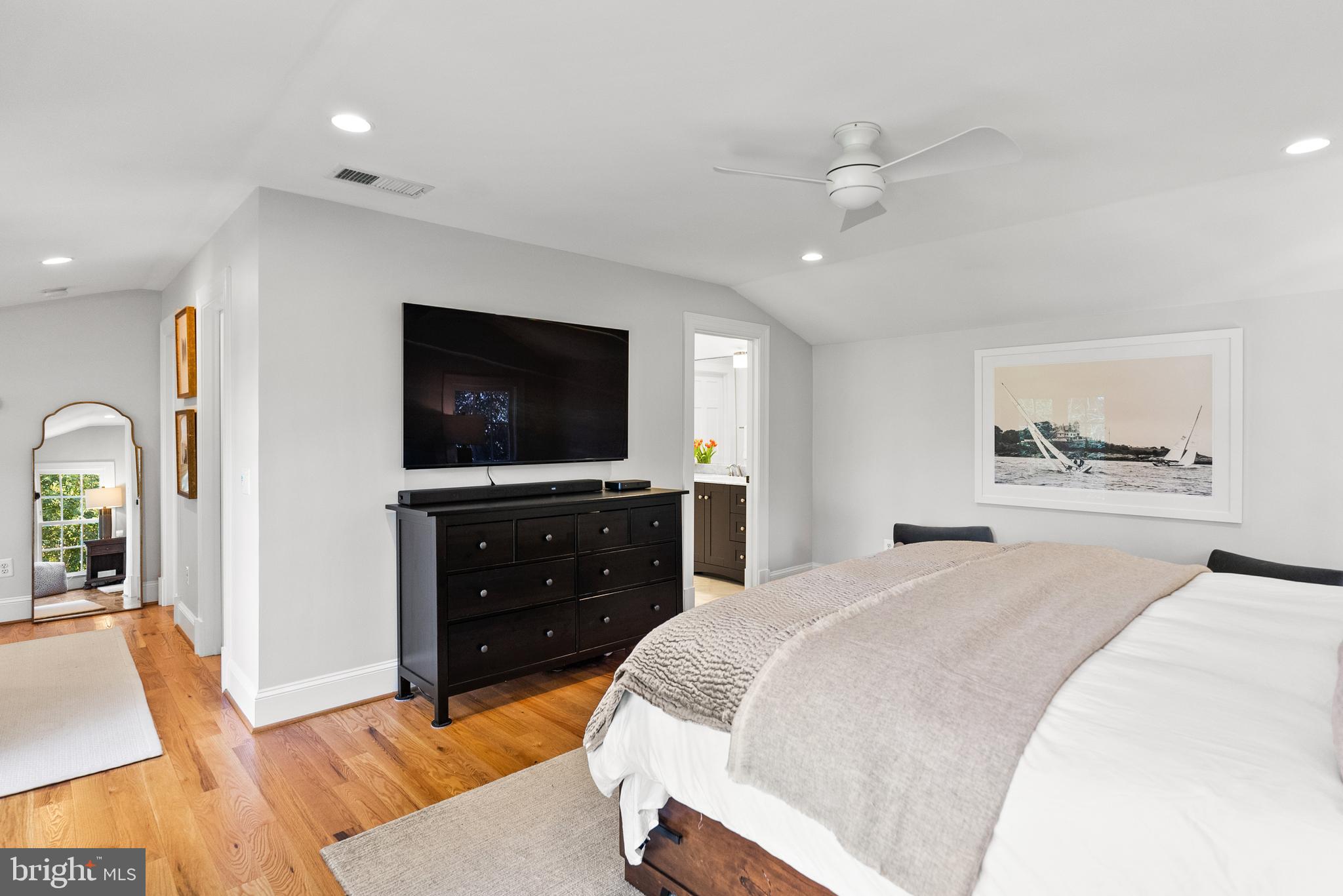 6032 Fort Hunt Road Alexandria, VA 22307 - Photo 27 of 49 a bedroom with a bed and a flat screen tv