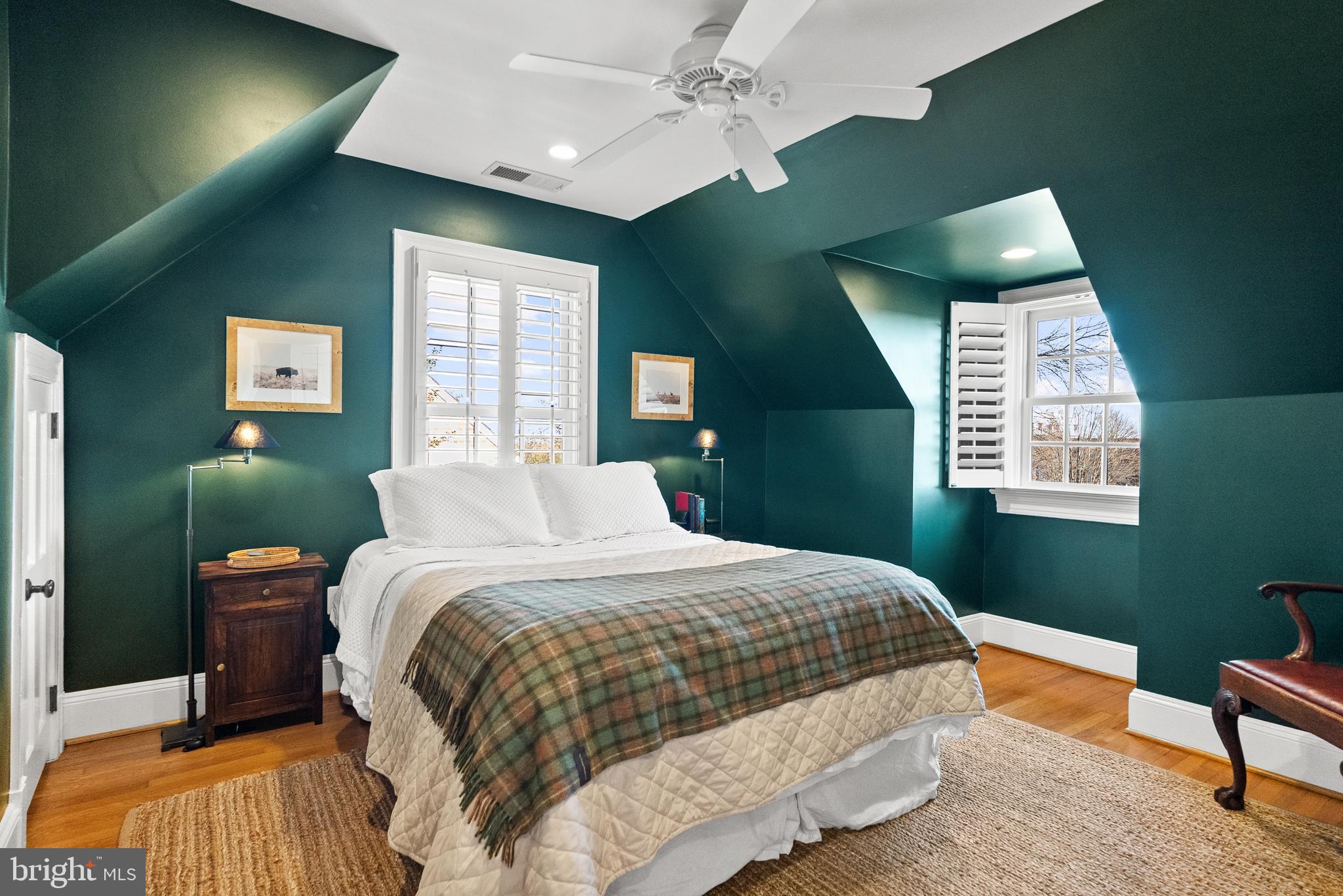 6032 Fort Hunt Road Alexandria, VA 22307 - Photo 35 of 49 a bedroom with a bed window and wooden floor