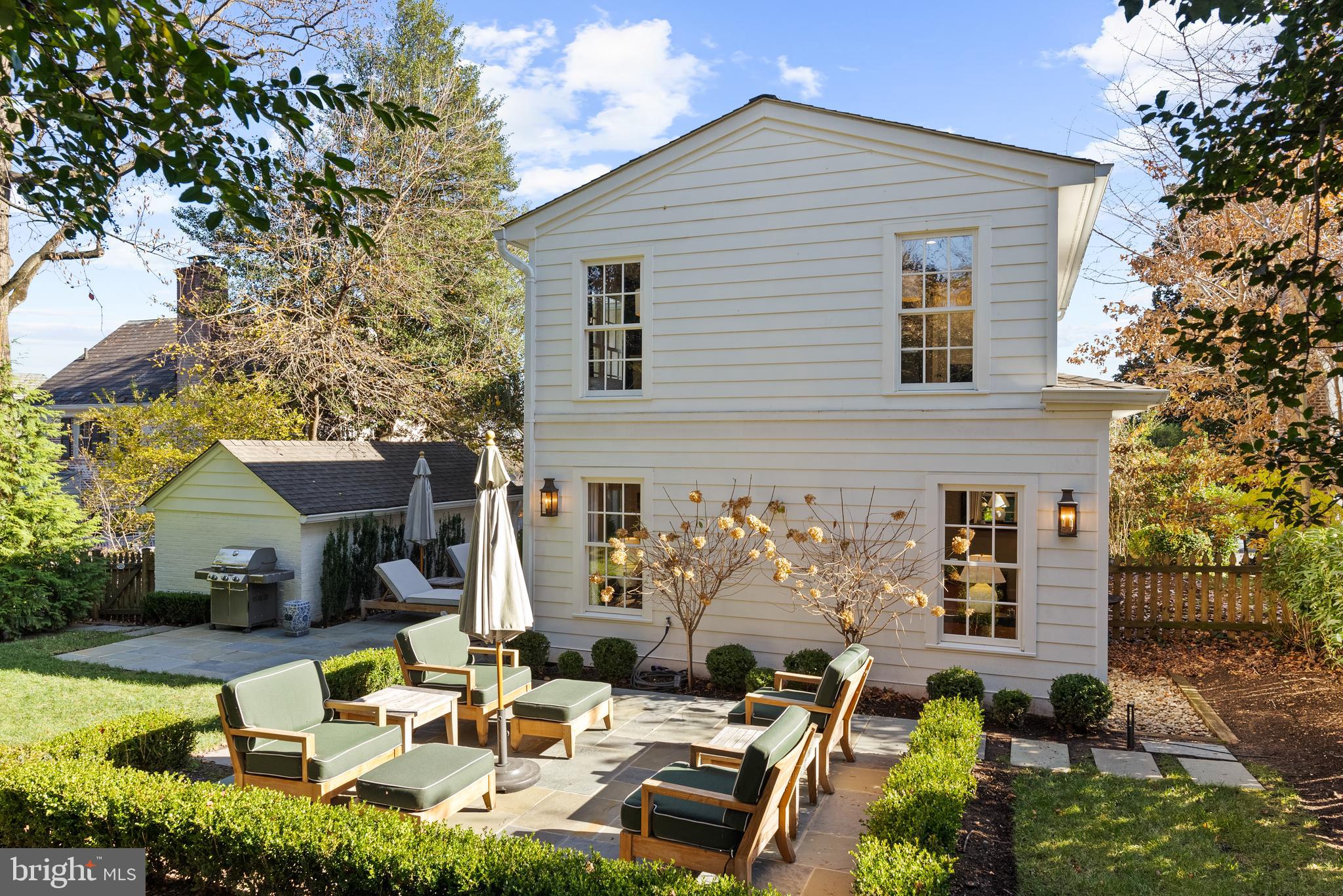 6032 Fort Hunt Road Alexandria, VA 22307 - Photo 43 of 49 a view of a patio with table and chairs and potted plants