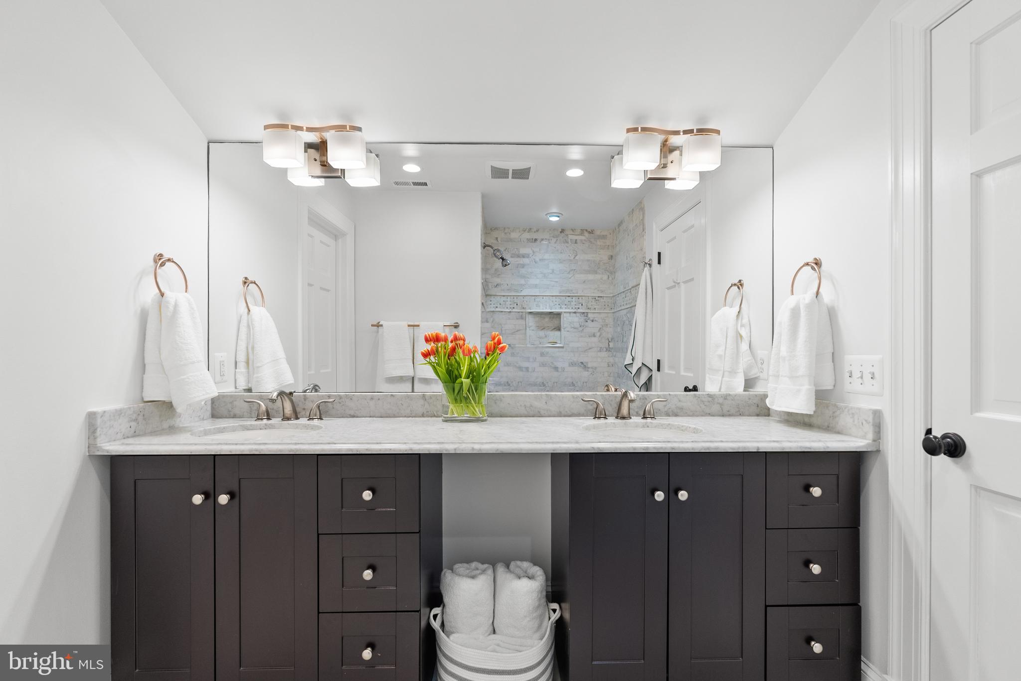 6032 Fort Hunt Road Alexandria, VA 22307 - Photo 6 of 49 a bathroom with a granite countertop sink and a mirror