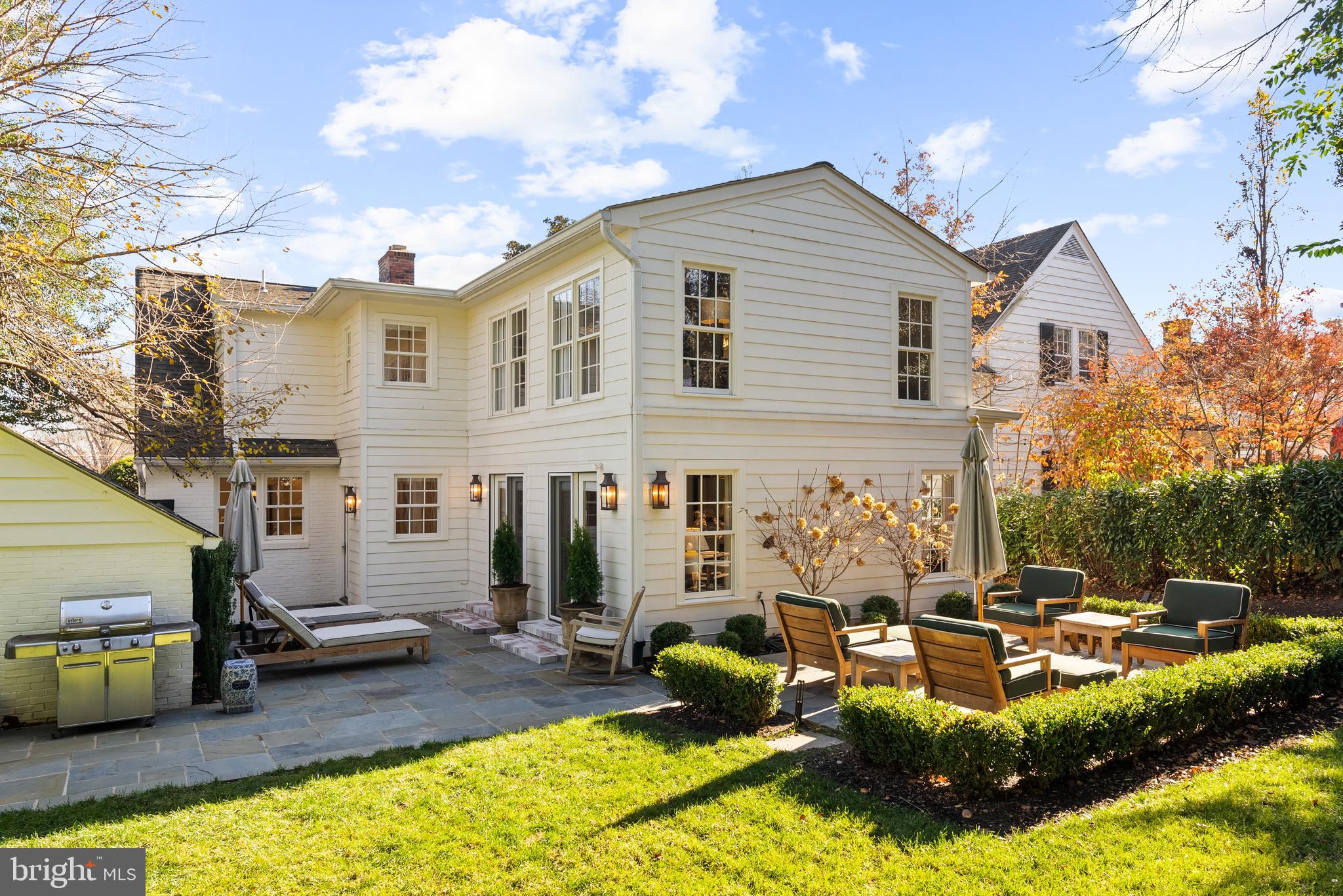 6032 Fort Hunt Road Alexandria, VA 22307 - Photo 7 of 49 a view of a white house with swimming pool and sitting area