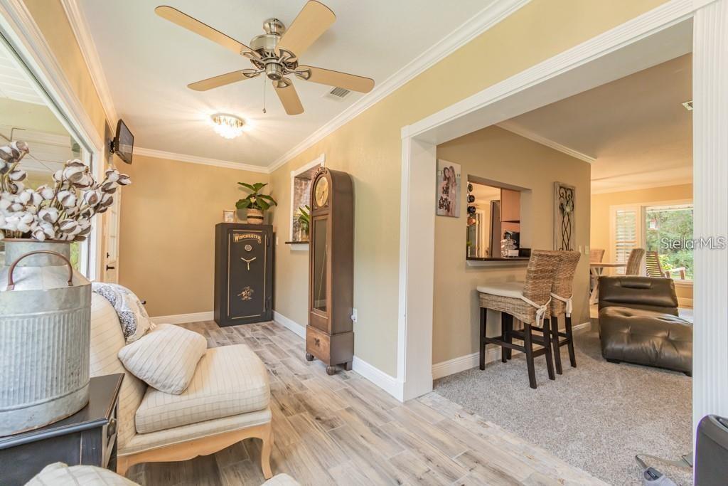 3341 Southeast 45th Street Ocala, FL 34480 - Photo 20 of 50 a view of a livingroom with furniture and a ceiling fan