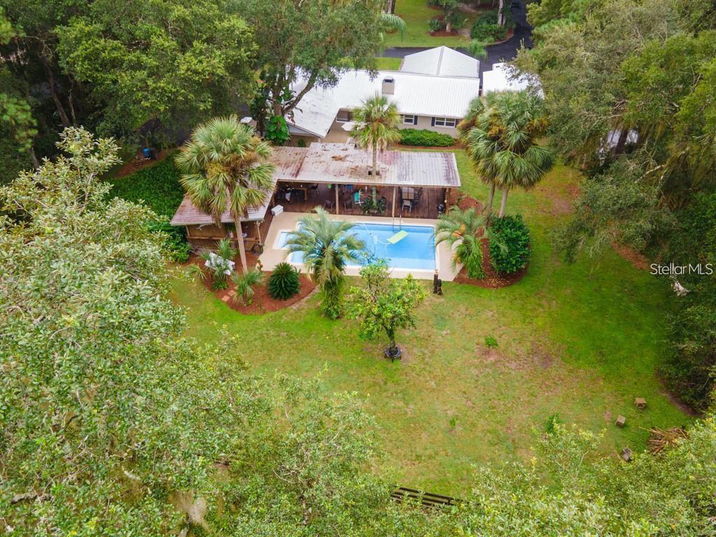 3341 Southeast 45th Street Ocala, FL 34480 - Photo 28 of 50 an aerial view of a house with a yard