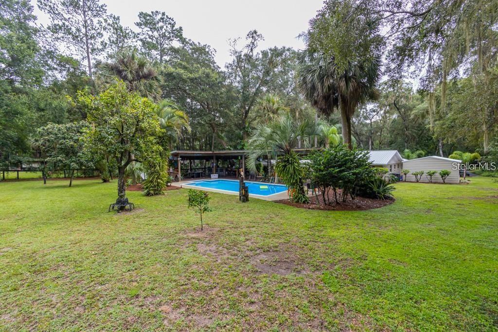 3341 Southeast 45th Street Ocala, FL 34480 - Photo 41 of 50 a view of a park with large trees