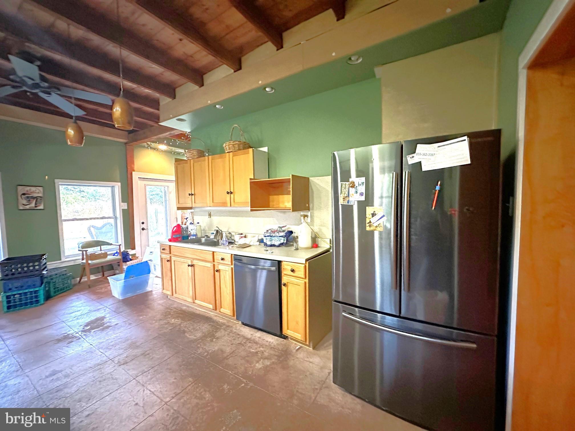 411 Marshall Road Glenmoore, PA 19343 - Photo 13 of 49 a kitchen with a refrigerator and a sink