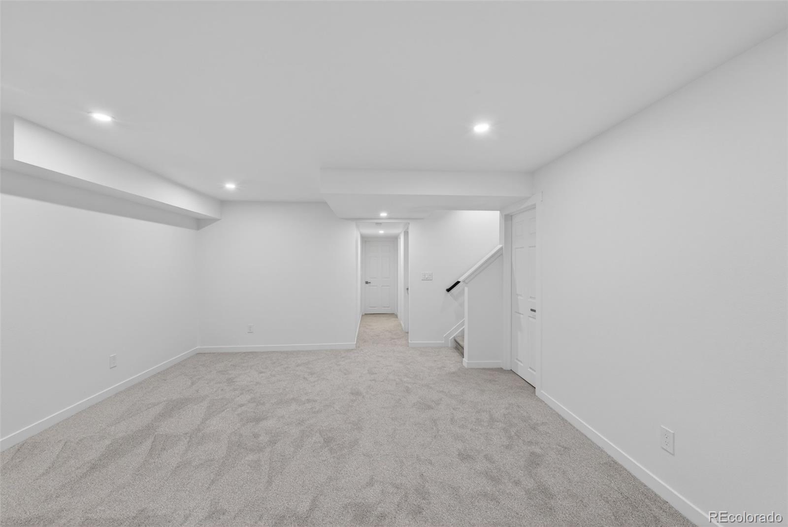 8943 Greenspointe Lane Highlands Ranch, CO 80130 - Photo 25 of 38 an empty room with an entryway