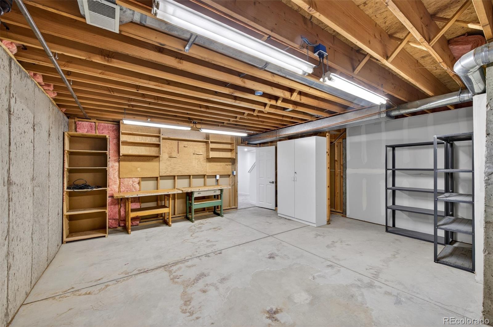 8943 Greenspointe Lane Highlands Ranch, CO 80130 - Photo 32 of 38 a view of room with walk in closet