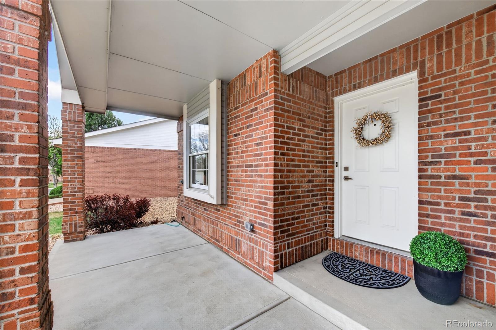 8943 Greenspointe Lane Highlands Ranch, CO 80130 - Photo 38 of 38 a view of a house with a potted plant