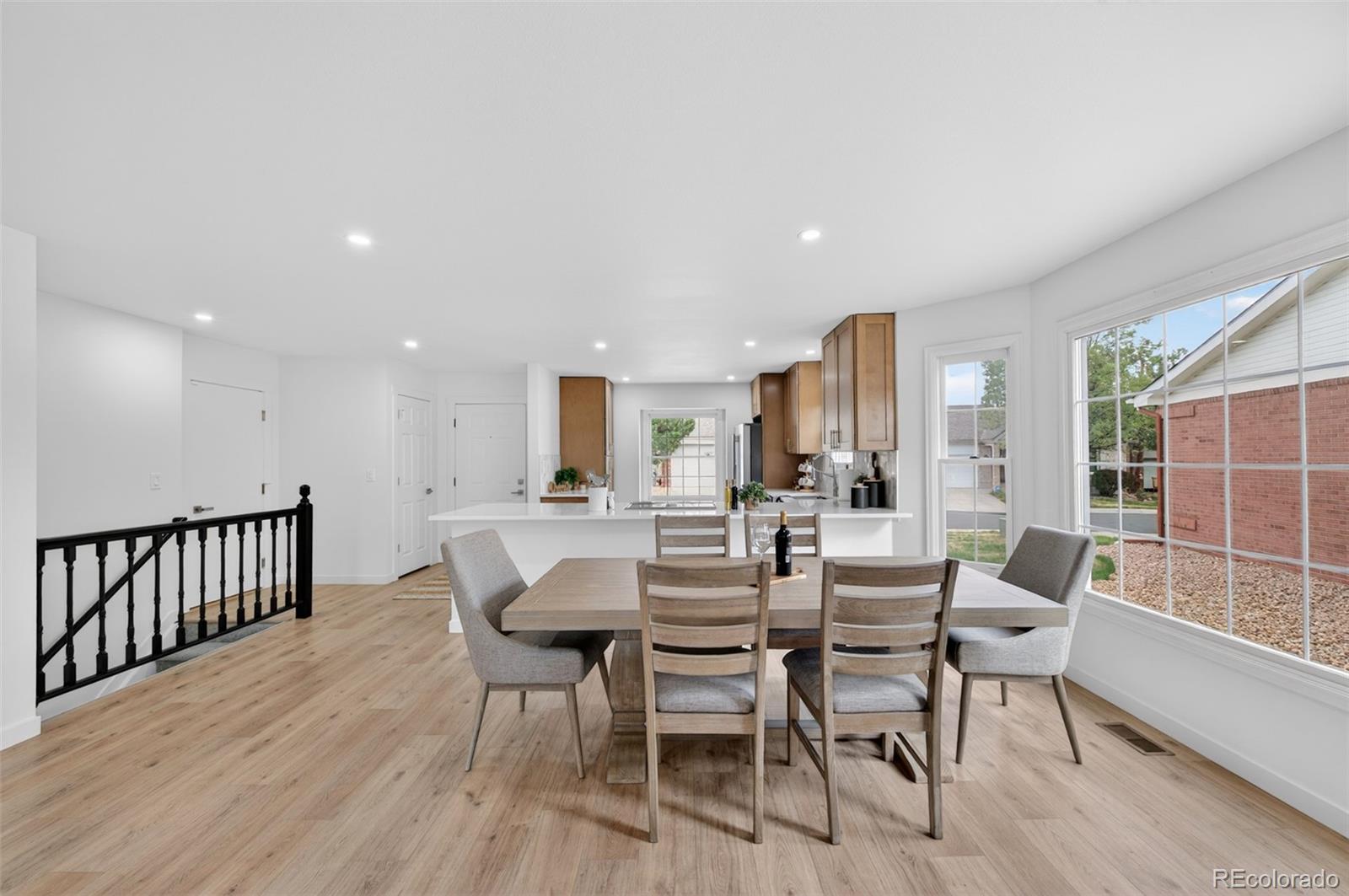 8943 Greenspointe Lane Highlands Ranch, CO 80130 - Photo 7 of 38 a view of a dining room with furniture window and outside view
