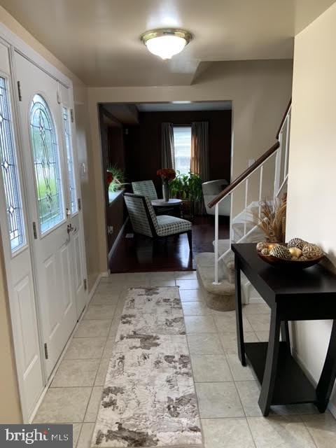 30 East Stokes Road Willingboro, NJ 08046 - Photo 3 of 26 a living room with furniture and a rug