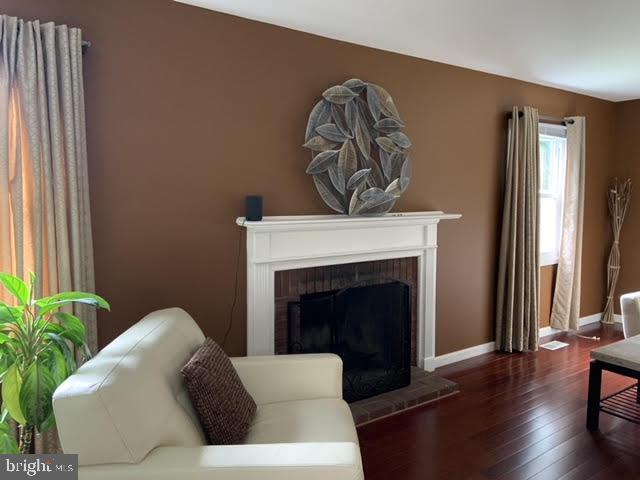 30 East Stokes Road Willingboro, NJ 08046 - Photo 6 of 26 a living room with furniture and a fireplace