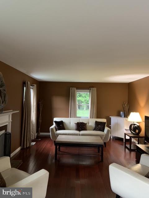 30 East Stokes Road Willingboro, NJ 08046 - Photo 7 of 26 a living room with furniture and a window