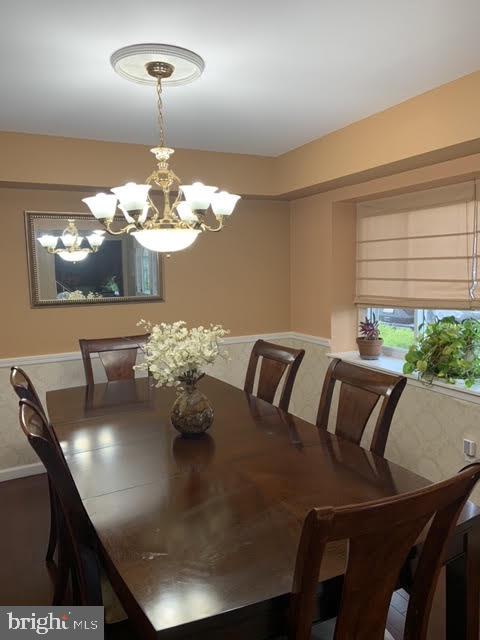 30 East Stokes Road Willingboro, NJ 08046 - Photo 10 of 26 a view of a dining room with furniture and chandelier