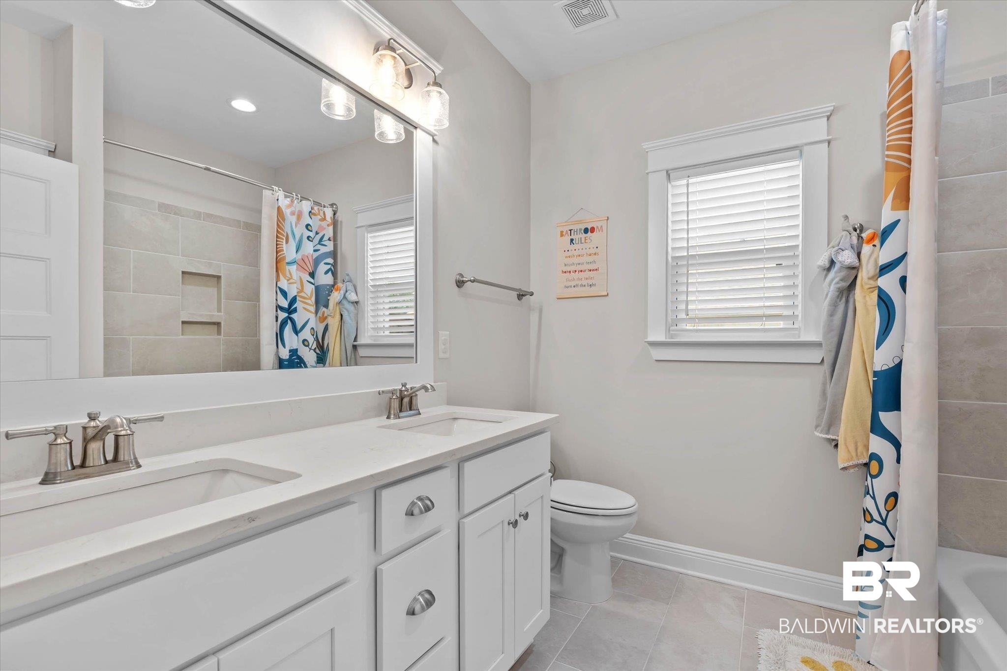 23523 Travis Stock Street Foley, AL 36535 - Photo 21 of 45 Double vanity with undermount sinks and brushed nickel fixtures