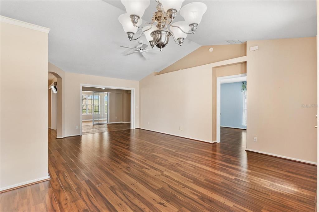 11614 Southeast 172nd Loop Summerfield, FL 34491 - Photo 11 of 55 a view of a livingroom with wooden floor