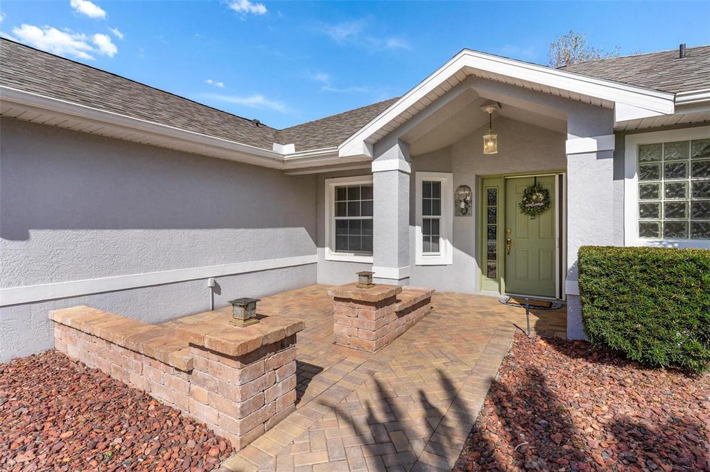 11614 Southeast 172nd Loop Summerfield, FL 34491 - Photo 4 of 55 a bedroom with a bed and a large window