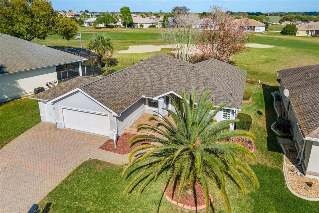 11614 Southeast 172nd Loop Summerfield, FL 34491 - Photo 52 of 55 an aerial view of a house with a garden and lake view