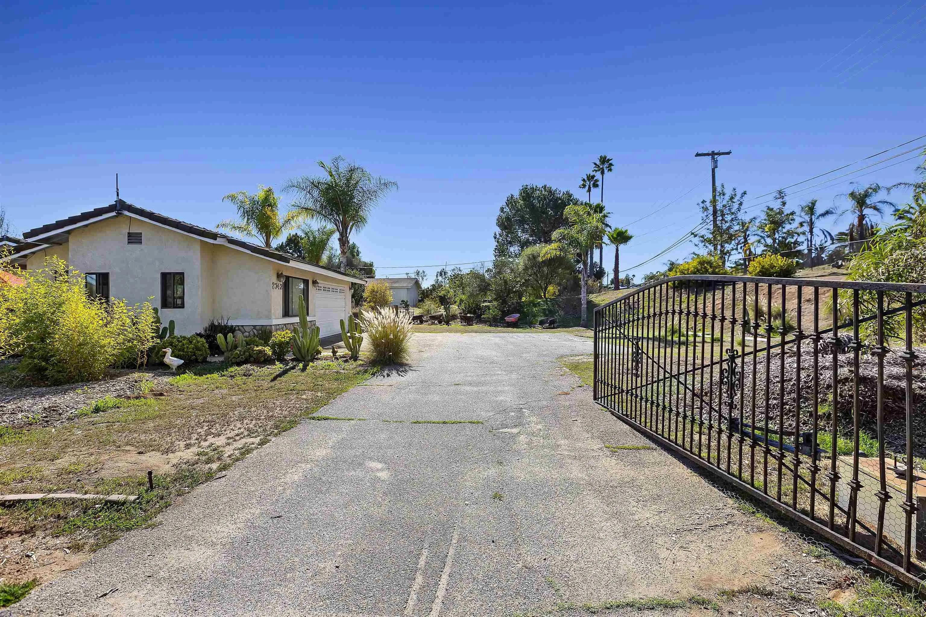 3742 Olive Hill Road Fallbrook, CA 92028 - Photo 4 of 42 a view of a backyard