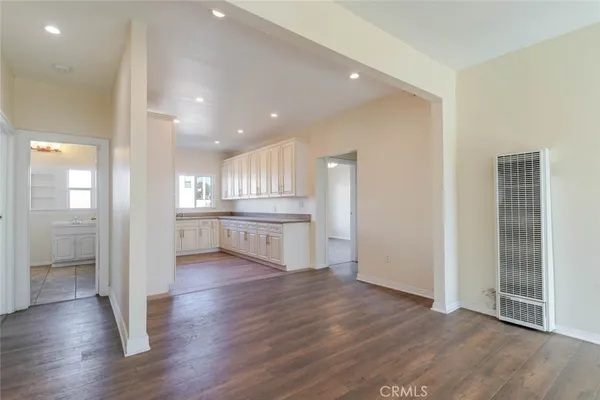 a view of kitchen with wooden floor