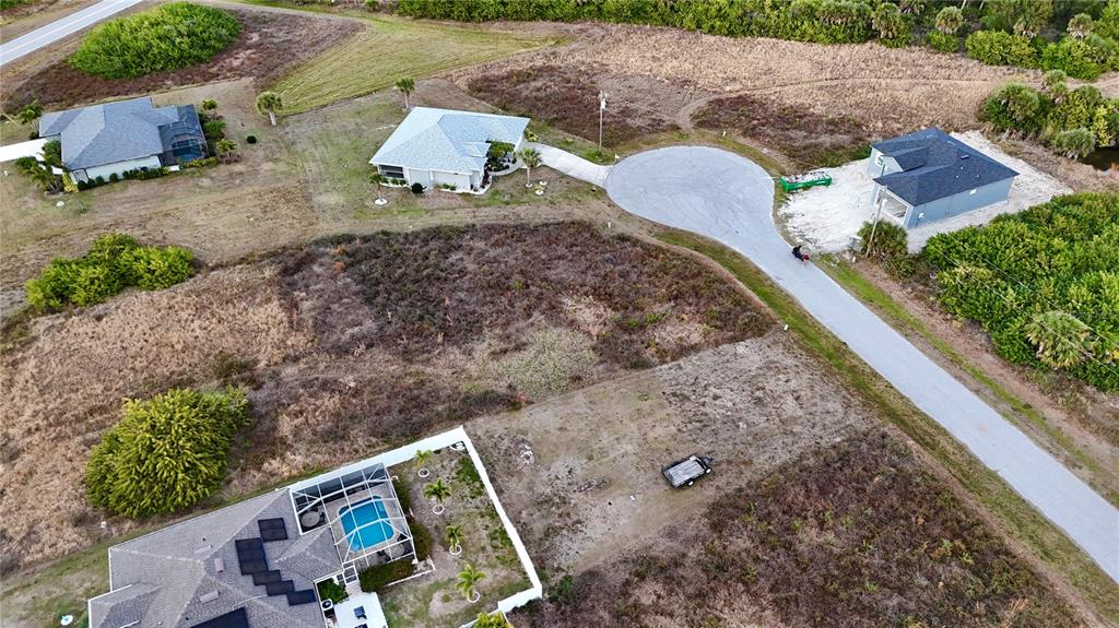 116 Temper Lane Rotonda West, FL 33947 - Photo 4 of 6 a view of backyard with outdoor space