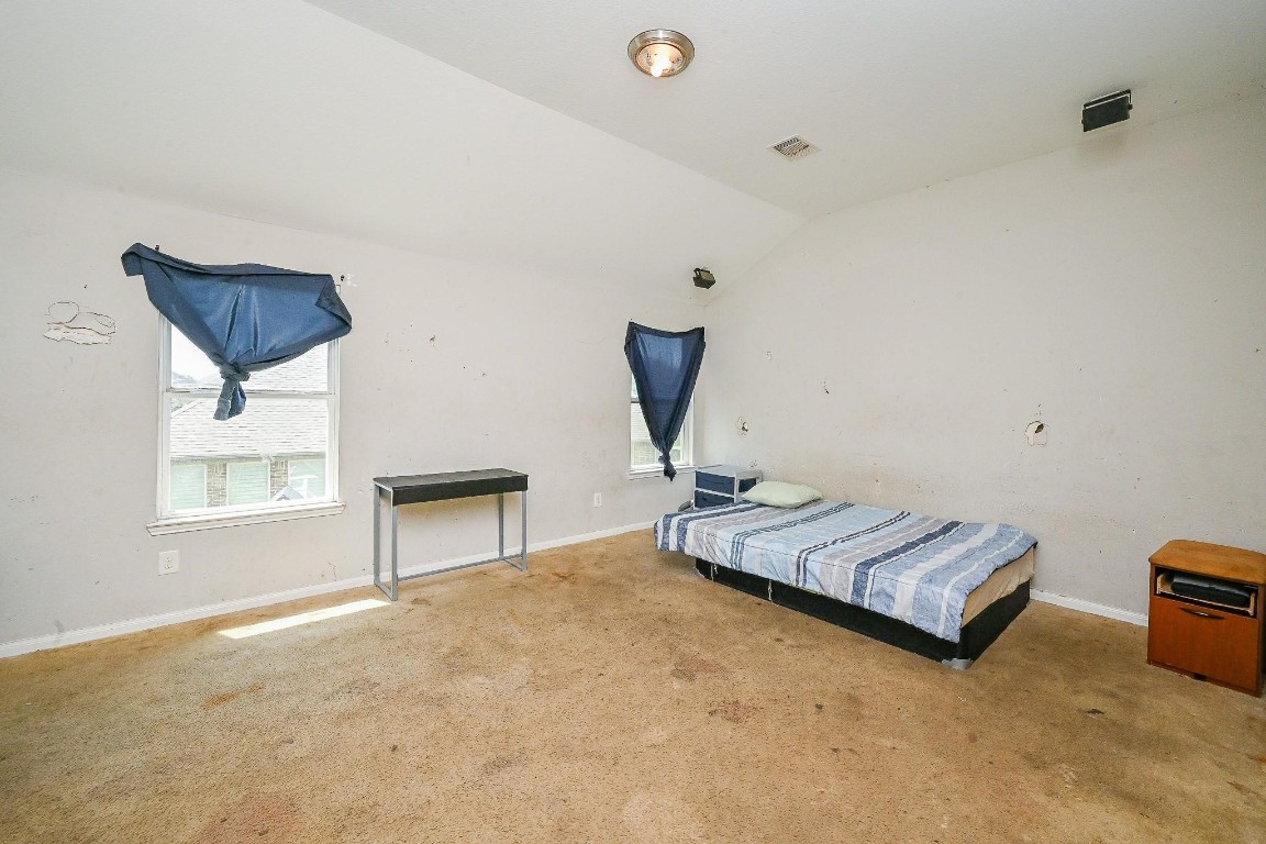 7007 Flewellen Falls Lane Spring, TX 77379 - Photo 16 of 20 a living room with furniture and a window