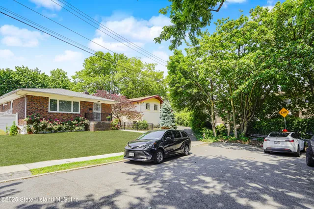 a house view with a garden space