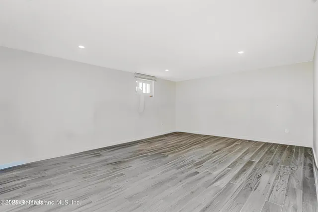 a view of a hallway with washer and dryer