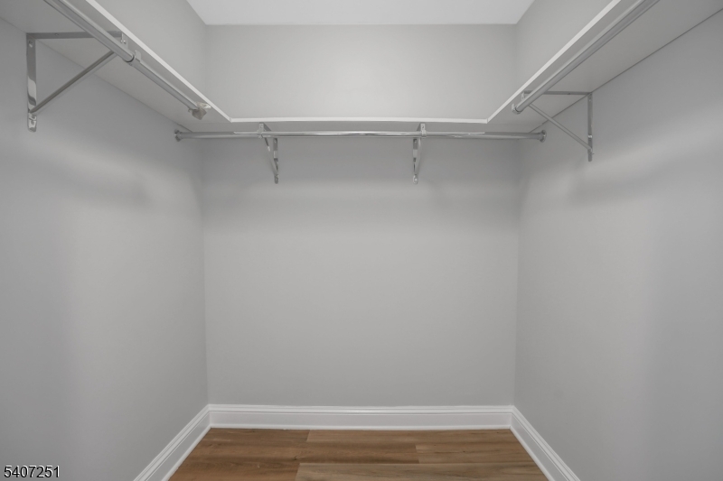 40 West Park Place, Unit 412 Morristown, NJ 07960 - Photo 13 of 32 a view of an empty walk in closet