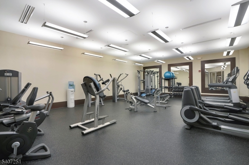 40 West Park Place, Unit 412 Morristown, NJ 07960 - Photo 29 of 32 a view of a room with gym equipment