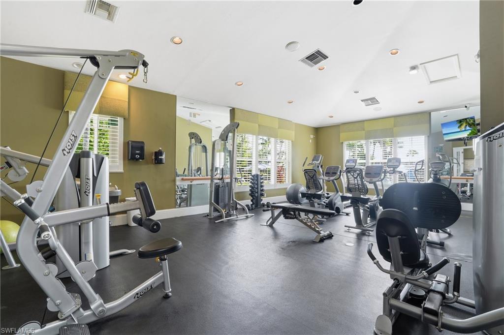 7920 Mahogany Run Lane, Unit 1015 Naples, FL 34113 - Photo 12 of 41 a view of a room with gym equipment
