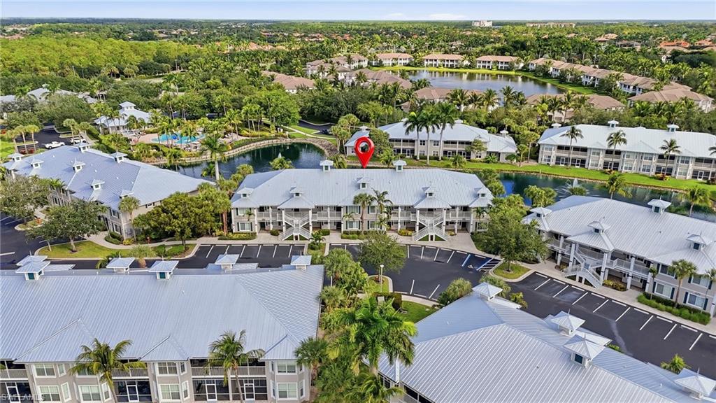 7920 Mahogany Run Lane, Unit 1015 Naples, FL 34113 - Photo 34 of 41 an aerial view of houses with yard