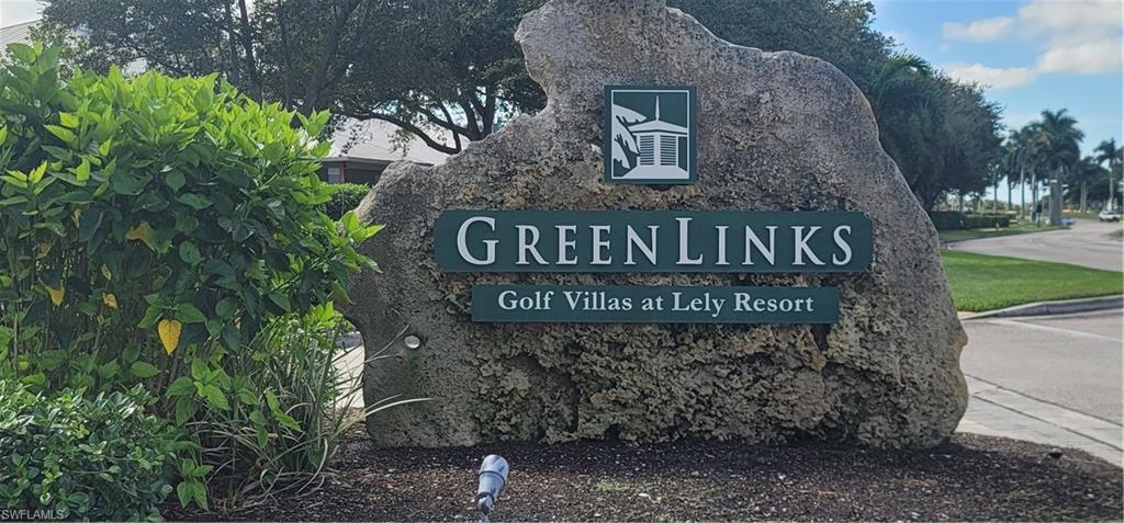 7920 Mahogany Run Lane, Unit 1015 Naples, FL 34113 - Photo 40 of 41 a sign on the side of a building