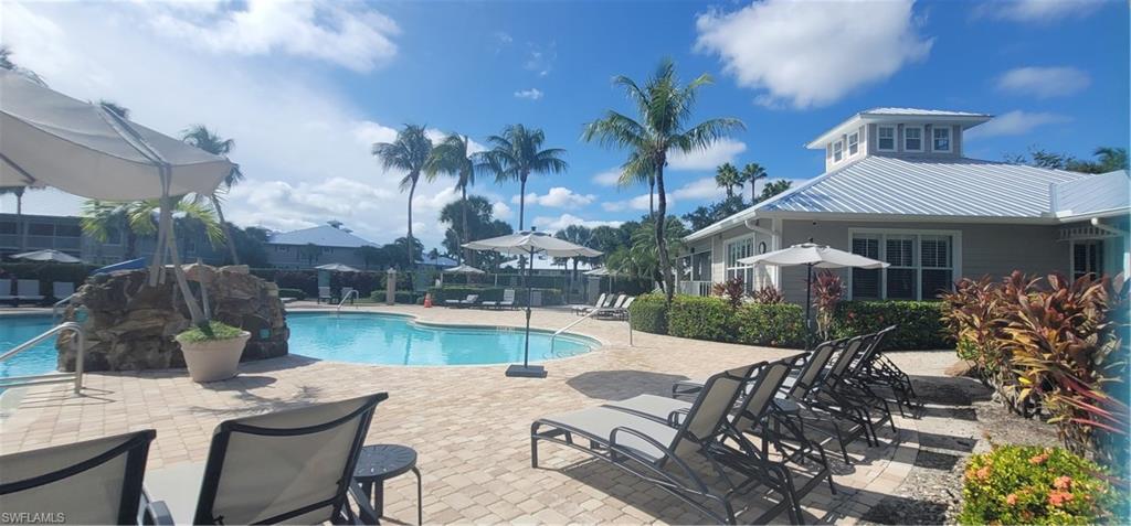7920 Mahogany Run Lane, Unit 1015 Naples, FL 34113 - Photo 7 of 41 a view of a house with backyard and sitting area