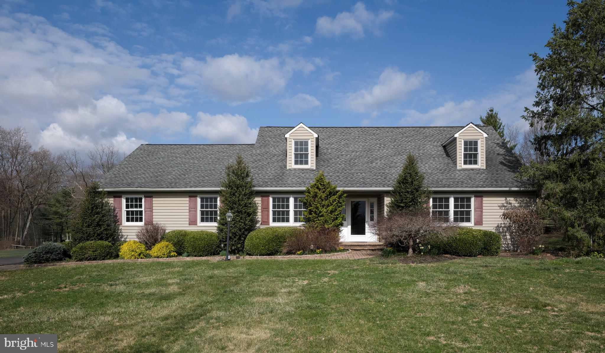 4902 Anderson Road Doylestown, PA 18902 - Photo 1 of 46 a front view of a house with a yard