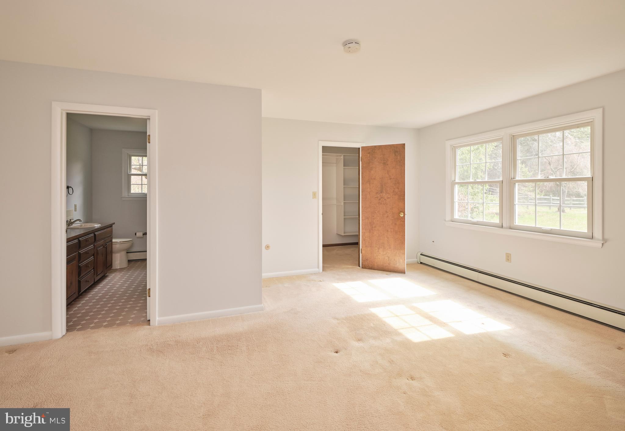 4902 Anderson Road Doylestown, PA 18902 - Photo 12 of 46 an empty room with windows and closet