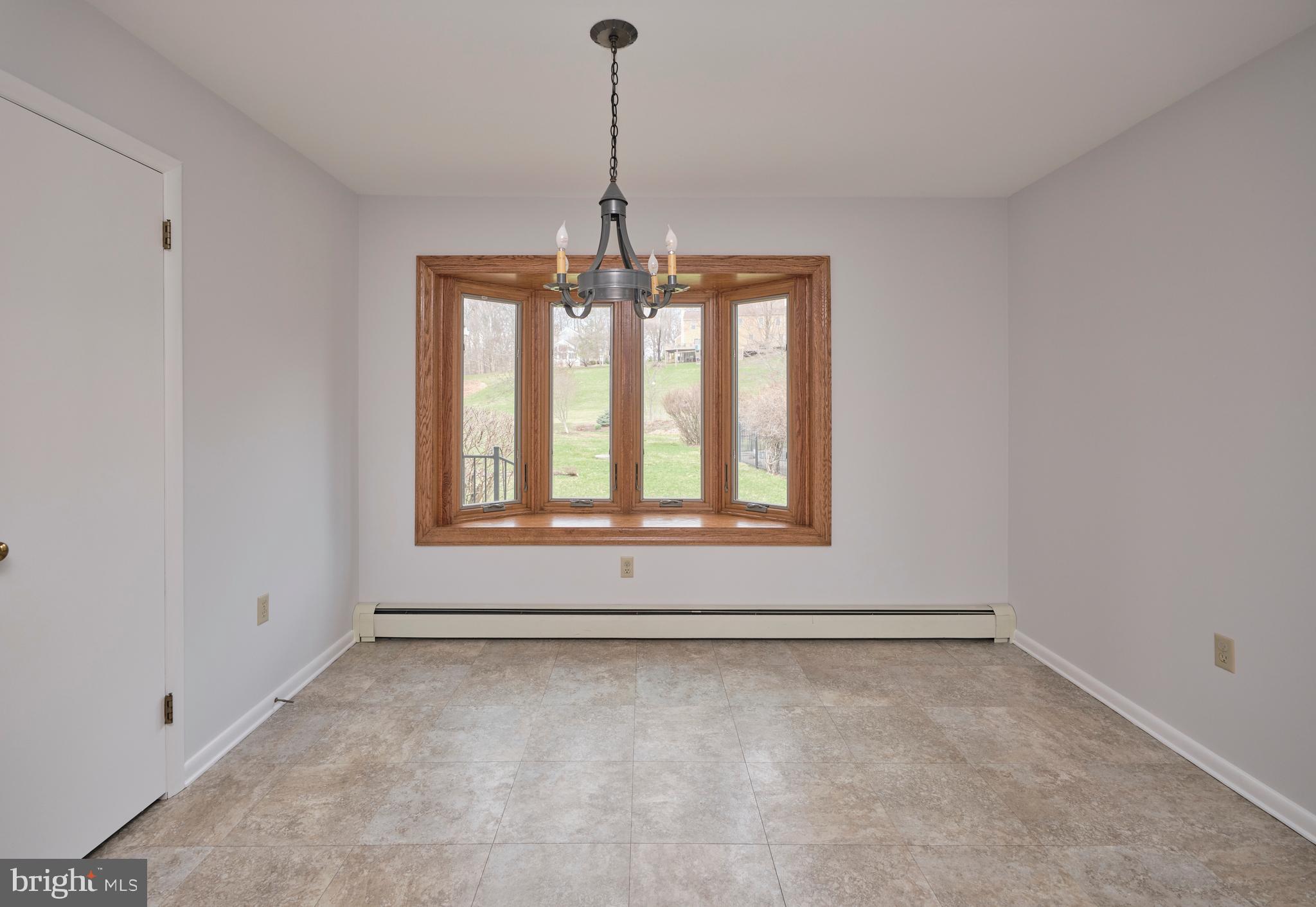 4902 Anderson Road Doylestown, PA 18902 - Photo 17 of 46 a view of an empty room with a window