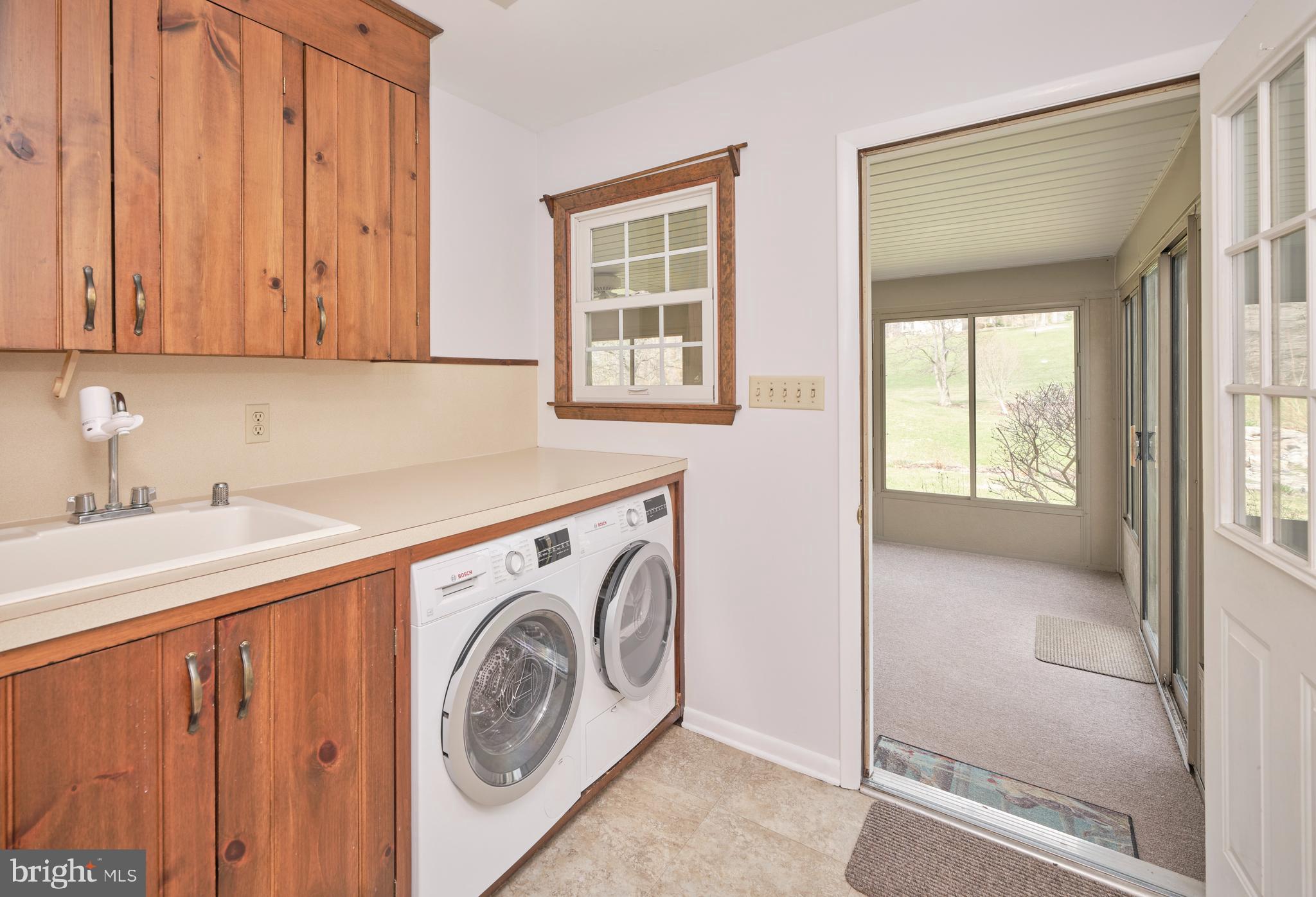 4902 Anderson Road Doylestown, PA 18902 - Photo 21 of 46 a utility room with dryer and washer