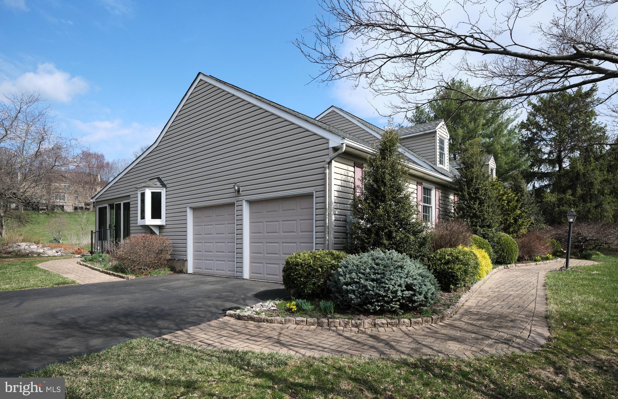 4902 Anderson Road Doylestown, PA 18902 - Photo 4 of 46 a view of a house with a yard and large tree